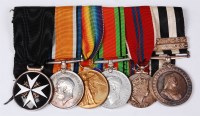 Lot 394 - A group of six medals to include Order of St...