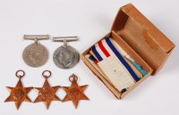 Lot 410 - A WW II group of five medals to include...