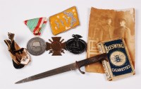 Lot 411 - A group of medals to include WW I German Cross...