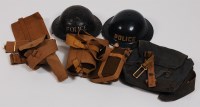 Lot 474 - A WW II Brodie pattern steel policeman's...