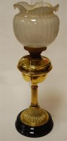 Lot 6 - An early 20th century brass pedestal oil lamp...