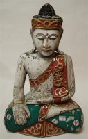 Lot 21 - A large carved softwood figure of a Tibetan...