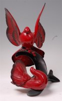 Lot 39 - A Royal Doulton flambe glazed ceramic figure...