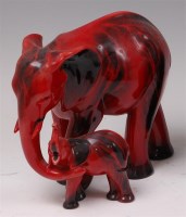 Lot 41 - A Royal Doulton flambe glazed ceramic figure...