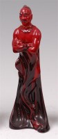 Lot 45 - A Royal Doulton flambe glazed ceramic figure...