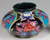 Lot 56 - A modern Moorcroft pottery squat vase in the...