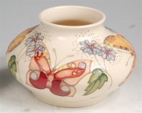 Lot 58 - A modern Moorcroft pottery squat vase in the...