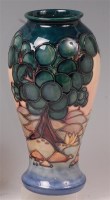 Lot 63 - A modern Moorcroft baluster form pottery vase,...