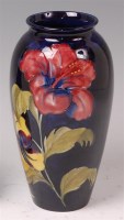 Lot 78 - A Moorcroft pottery vase, in the Hibiscus...