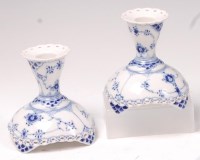 Lot 109 - A pair of Royal Copenhagen squat candlesticks,...