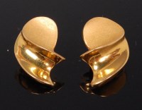 Lot 130 - A pair of modern 18ct gold ear clips, each of...