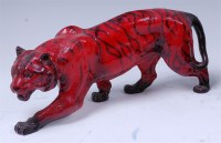 Lot 37 - A Royal Doulton flambe glazed ceramic model of...