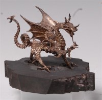 Lot 157 - A contemporary silver model of a dragon,...