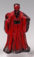 Lot 44 - A Royal Doulton flambe glazed ceramic figure...