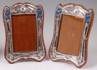 Lot 161 - A near-pair of Art Nouveau silver and enamel...