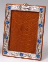Lot 165 - An Art Nouveau silver and enamel photograph...