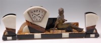 Lot 167 - An Art Deco variegated marble, black slate and...