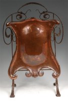 Lot 178 - An Art Nouveau wrought iron and copper fire...