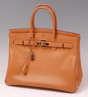 Lot 180 - A Hermès tan leather Birkin bag, with gilt...