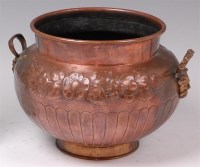 Lot 182 - An Art Nouveau embossed copper and twin brass...