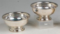 Lot 138 - A pair of Art Deco silver circular footed...