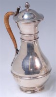 Lot 146 - An Arts & Crafts silver lidded jug by James...