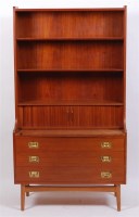 Lot 330 - A 1960s Danish teak bookcase, having open...