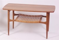 Lot 337 - A 1960s Danish teak and oak round cornered low...