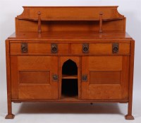 Lot 338 - An Arts & Crafts oak ledgeback sideboard, by...