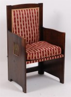 Lot 342 - An Arts & Crafts oak armchair, having red...