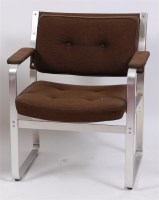 Lot 344 - A 1970s aluminium framed and brown buttonback...