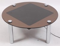 Lot 374 - A 1980s circular smoky glass topped fibre...