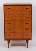 Lot 378 - A 1960s Danish teak chest, of six long drawers,...