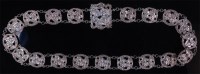 Lot 135 - An Art Nouveau silver chainlink nurses belt,...