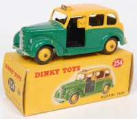 Lot 1954 - Dinky Toys, 254 Austin Taxi, two-tone issue,...