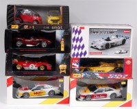 Lot 2669 - 7 assorted 1/18th scale diecast vehicles, to...