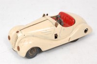 Lot 3151 - Schuco 4001 Examico tinplate and clockwork car,...