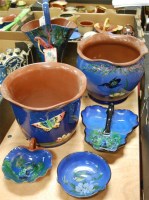 Lot 23 - A Longpark pottery jardiniere, on a blue...