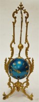 Lot 42 - A mystery clock in the form of a blue globe...