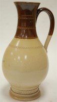 Lot 52 - A late 19th century salt glazed stoneware jug