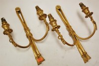 Lot 66 - A pair of gilt metal twin sconce wall light...