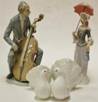 Lot 73 - A large Lladro figure of a cello player having...