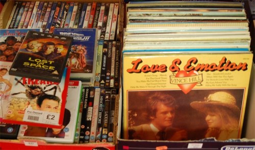 Lot 442 - A box of assorted DVDs; together with various LPs