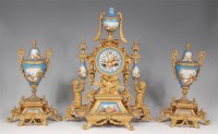 Lot 1101 - A 19th century French gilt metal and porcelain...