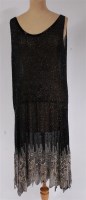 Lot 927 - A 1920s ladies fully tambour beaded dress,...