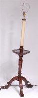 Lot 1132 - A mahogany lamp standard, in the style of a...