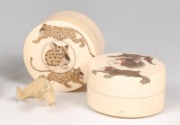 Lot 1017 - A pair of Japanese Meiji period ivory dressing...