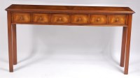 Lot 1142 - A walnut and crossbanded six drawer hall table,...