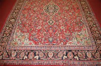 Lot 1153 - A Persian woollen Tabriz carpet, the red...