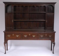 Lot 1170 - A late 19th century oak dresser, the panelled...